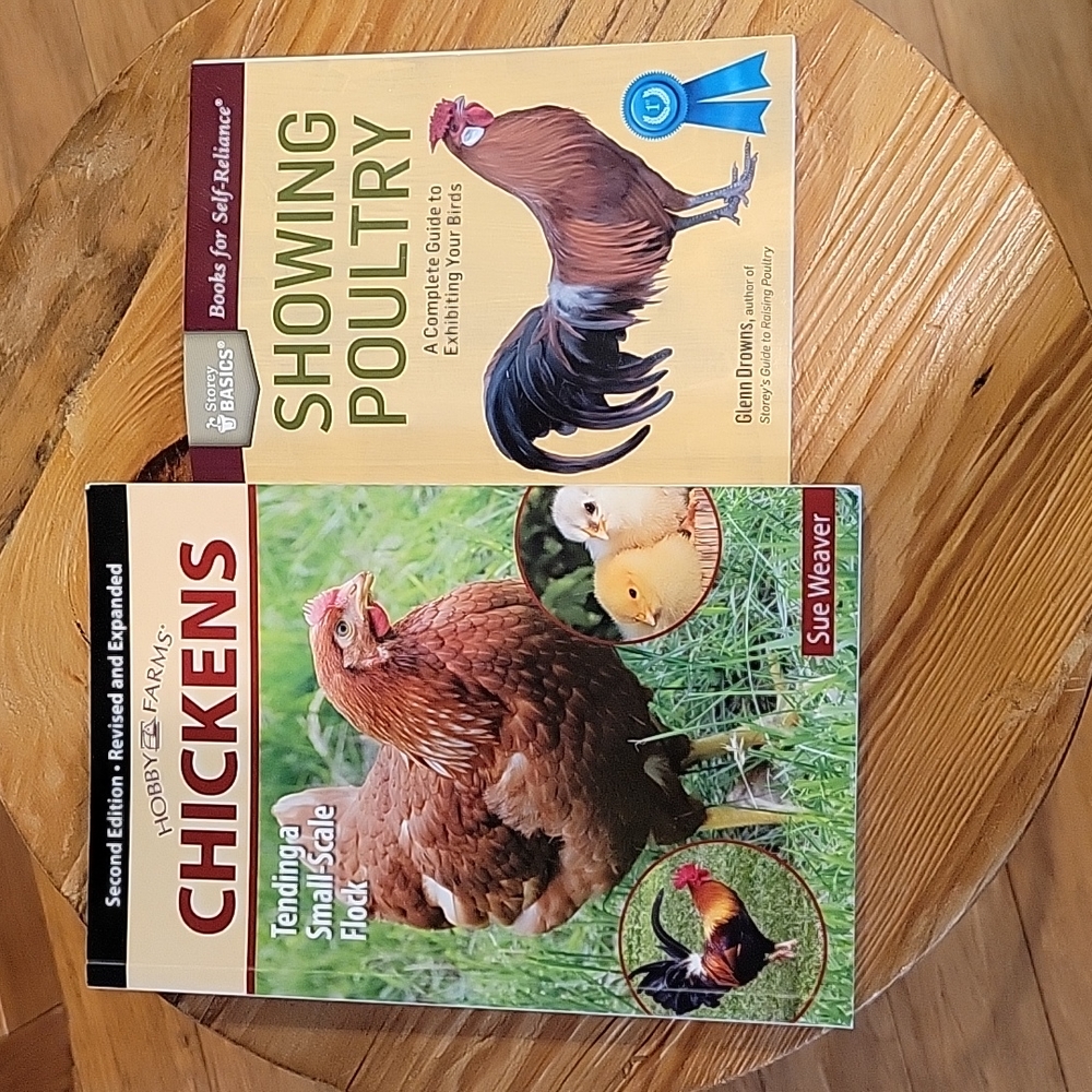 2 Books about raising and showing chickens.